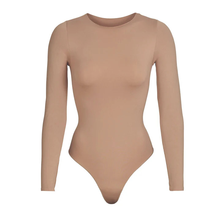 ESSENTIAL CREW NECK LONG SLEEVE BODYSUIT | TIGERS EYE | SKIMS (US)