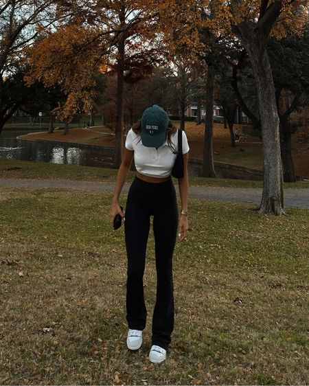 seasonal outfit ideas for warm Fall days 
— Alo yoga leggings + crop polo top — New Balance 550s — New York cap from Princess Polly 

fall style, fall fashion, lounge style, active, street style, pickleball outfit 

#LTKSeasonal #LTKfit #LTKstyletip