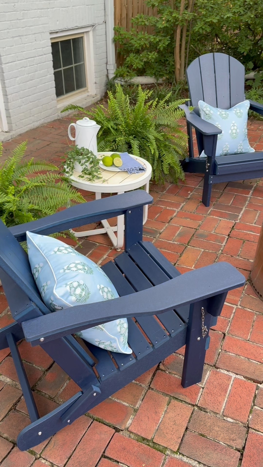 Ever since we moved into our new house, I knew we’d want to create a little oasis on our back patio, but it needed some help! Our old patio furniture was falling apart and it was time for an update. Enter: Wayfair! They had everything we needed to make this our new favorite spot to hang out now that the weather has warmed up. The weather-proof blue Adirondack chairs and the white resin planters for our ferns are my favorite pieces. If you’re looking for some new patio furniture for your home, don’t sleep on Wayfair! They have an amazing selection that ships fast!

@wayfair #Wayfair #Ad