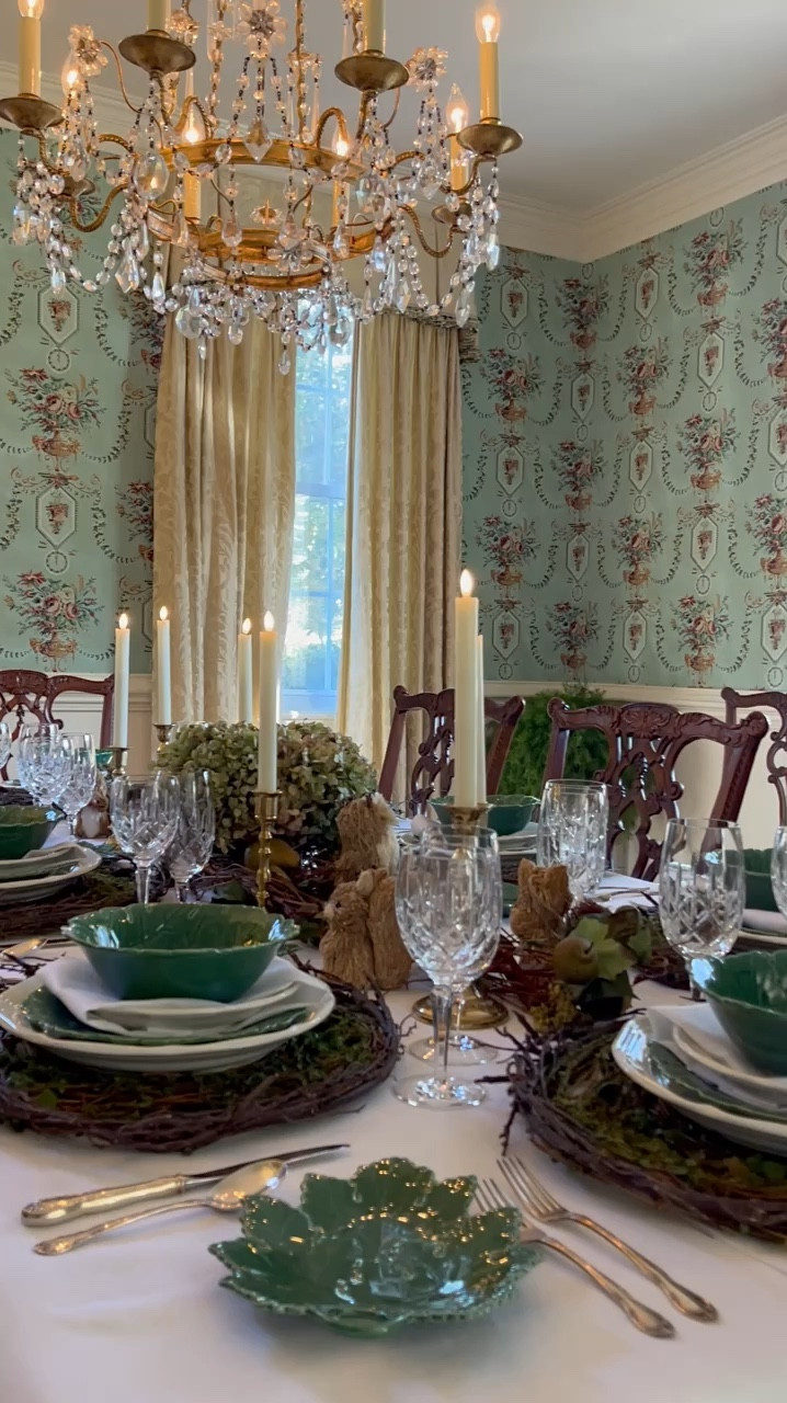 Did you know your dining table can be the perfect canvas to create something truly magical? 🍂✨ For me, it’s more than just a place to eat—it’s a chance to set the stage for unforgettable moments. 🐿️🍂

Sharing a woodland-inspired autumn table from last season that’s filled with earthy textures and warm tones of brown, green, gold, and burgundy. The low-profile centerpiece, perfect for easy conversation, features twig swags and a wicker cornucopia overflowing with dried hydrangeas. In addition there are velvet pumpkins, faux fruit, and adorable woodland critters scattered about. 🐿️🍁

Each place setting is a stack of vintage green and white dinnerware, beautifully displayed on rustic grapevine chargers. It’s like bringing the enchantment of the forest right to your table! 🦊What do you think—would you recreate this look for your own fall gatherings? 🍂

#FallTablescape #AutumnTableDecor #WoodlandVibes #VintageDinnerware #SeasonalDecorInspo #CozyFallVibes #ForestInspired #NeutralFallDecor #DinnerPartyIdeas #HarvestTables

#LTKStyleTip #LTKSeasonal #LTKHome