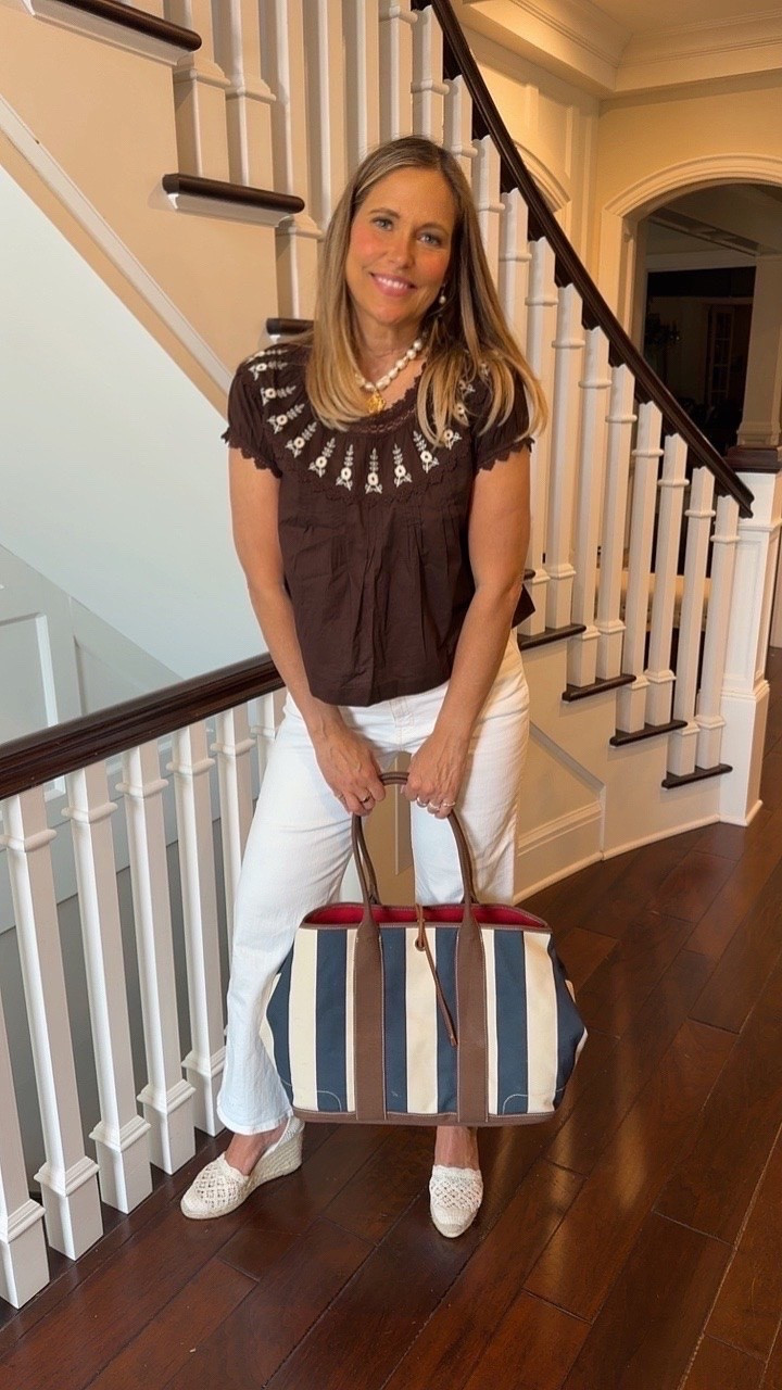 I am loving this outfit from head to toe. The neckline on this top is stunning and pairs so well with white pants. I styled it with a pearl necklace, patterned bag, and wedge heels for a pretty summer look.

#LTKootd #LTKgrwm #LTKdayinmylife