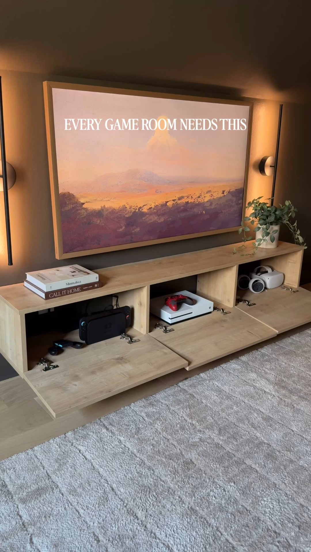 Cords be gone! My wall-mounted media console is half off right now during the @wayfair End of Year Clearance sale. 🙌🏼 

It holds up to 35 pounds of electronics. 🎮 I mounted it right over an outlet so all of the cords could be tucked neatly out of site and installed an in-wall cord system to run from the tv to the console. It was a bit of a project but I’m so happy with how it turned out! Follow along for the full bonus room theater makeover coming soon. 

Shop my media room must-haves now from #Wayfair — get up to 60% off plus free and easy delivery on orders over $35. #ad #WayfairPartner @shop.ltk #liketkit



#LTKHome