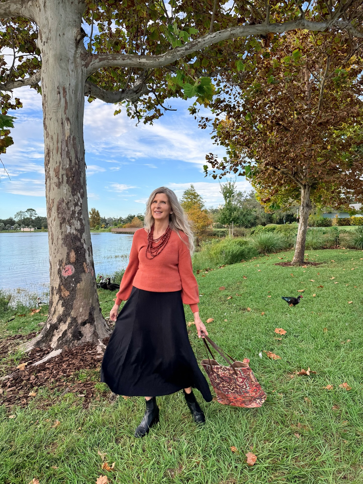 Is it Fall weather where you are? This black skirt & rust sweater from @soft_surroundings has me ready for it! Looking forward to wearing these separately too! The perfect colors for Fall! 

This necklace is semi-precious red jasper stones!! Bag has inside pockets & is large enough to carry a laptop! Love how soft the sweater is & don’t you just love the blouson sleeves? 

Shop these on my @shop.ltk page - link in bio or screenshot this ~ https://liketk.it/5pXLR and at SoftSurroundings.com 

blouson sleeves | layered necklace | tote bag | large handbag | #SoftSurroundingsFall #PreparetoFallinLove #ComfortInStyle
#falloutfitidea #falloutfitinspo #softsurroundings #liketkit #over50style #midlife #womenover40 #midlifewomen #over40fashion #fallcollection #womenover50 

#falloutfitidea #softsurroundings 

#LTKStyleTip #LTKSeasonal #LTKItBag