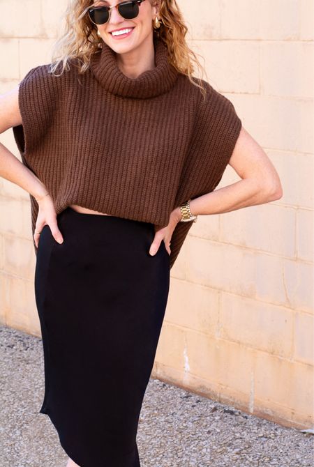 A cozy chocolate brown sweater with a black satin midi skirt for a holiday outfit idea  

#LTKstyletip #LTKHoliday #LTKCyberWeek