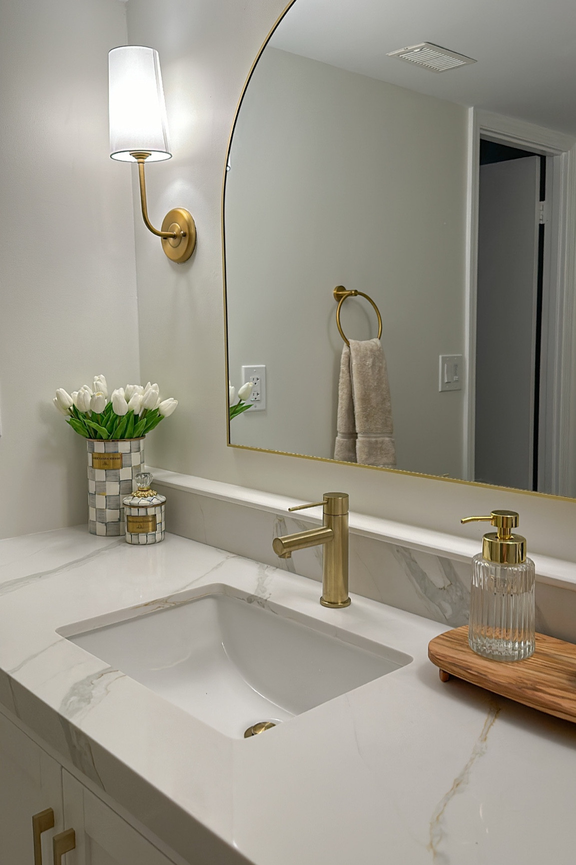 Bathroom Vanity decor, mirror, wall sconces, Mckenzie Child’s vase & canister, & faux tulips  

#LTKstyletip #LTKhome