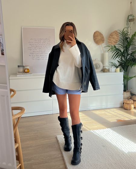 Blue stripe pyjama shorts and tuckable Abercrombie high neck cream jumper styled with knee high biker boots and oversized leather jacket 