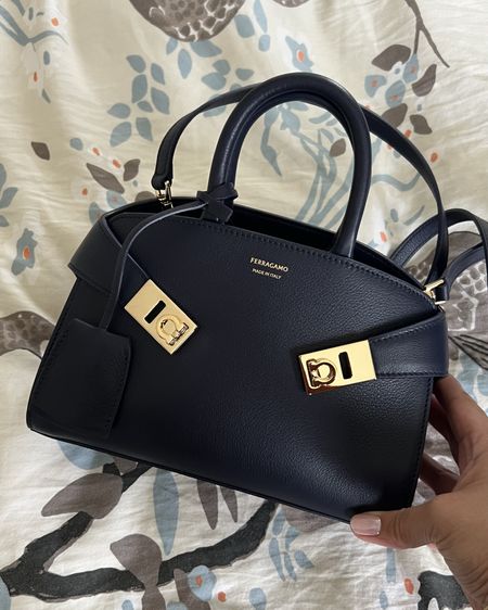 Welcome to the family cutie! The Ferragamo mini Hug bag is the perfect everyday bag! Fits so much! Comes in three sizes: Mini, small and medium. This midnight blue bag retails for $2200 and is under $1600 right now! 
-
Everyday bag - daily bag - Ferragamo hug bag - luxury bag - designer bag - Italian leather bag - work bag 

#LTKsalealert #LTKstyletip #LTKitbag