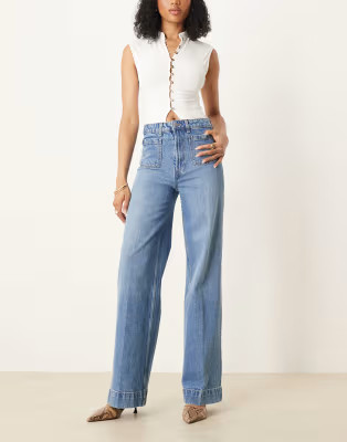ASOS DESIGN Tall high waist wide leg jeans with front pockets in&nbsp;mid blue | ASOS (Global)