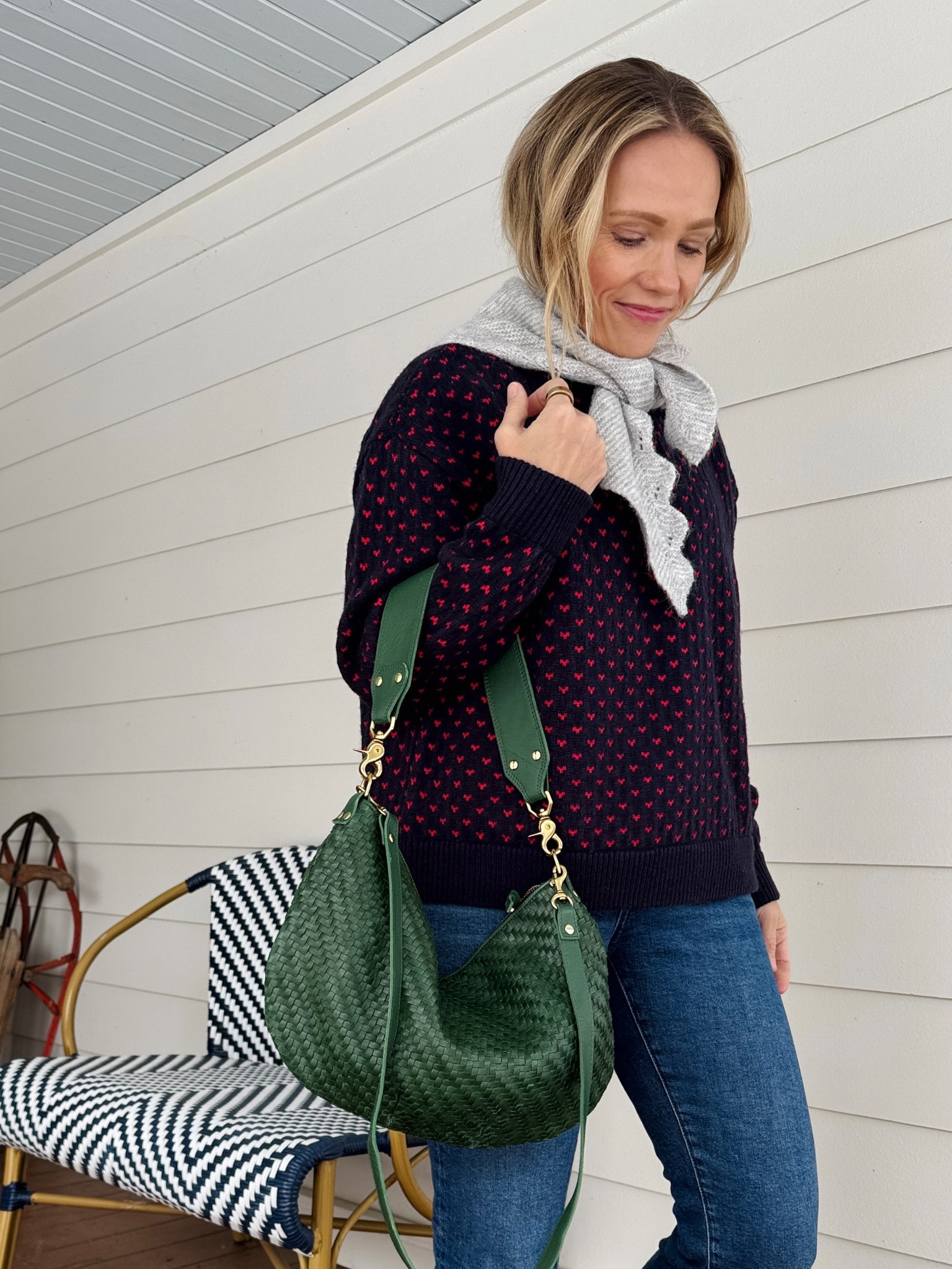 Clare V Moyen Messenger in evergreen, Anthropologie scallop triangle scarf, Pistola navy heart sweater wearing my regular size small, Madewell vintage corp flare jeans, are a closer fitting style but have a hint of stretch so wearing my regular size (5'3"), Kule stripe tee wearing a small, Dolce Vita front zip boots are true to size, J.Crew trouser socks set, Merit Flush Balm in leBonBon on cheeks & lips. xo, Claire

#LTKootd #LTKHoliday #LTKOver40