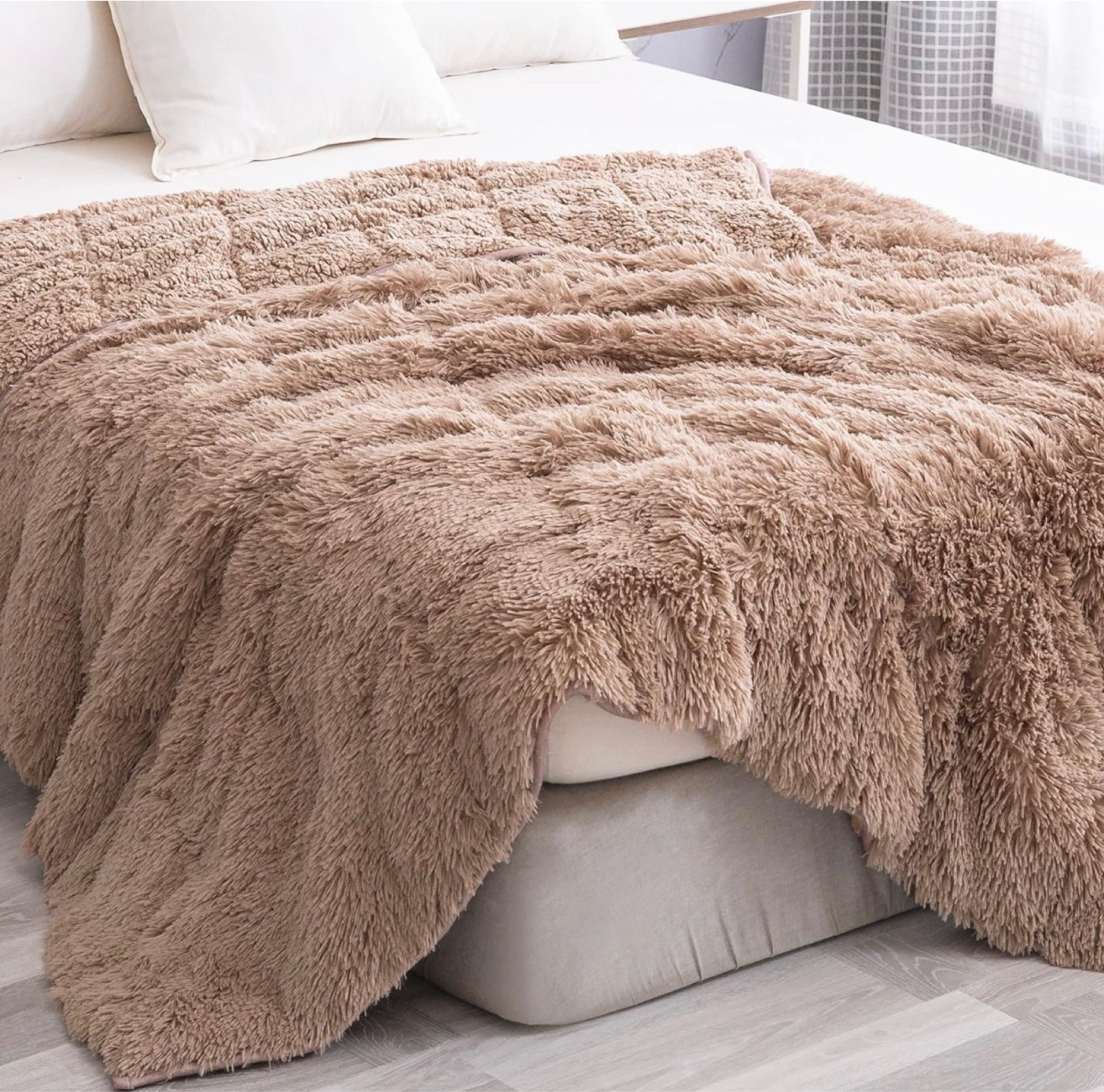 By far my favorite Christmas gift! This is a 15 pound weighted blanket is from Amazon. I am always cold in the winter time and wanted one of these for so long. They are supposed to promote calmness and be anxiety reducing. I just took the best nap with my new blanket. Love that it has shaggy with long faux fur. I felt like a bear cuddled up in a cave 🧸😆


I got the color Brown 60 x 80 Inches!

#LTKhome #LTKfamily #LTKSeasonal