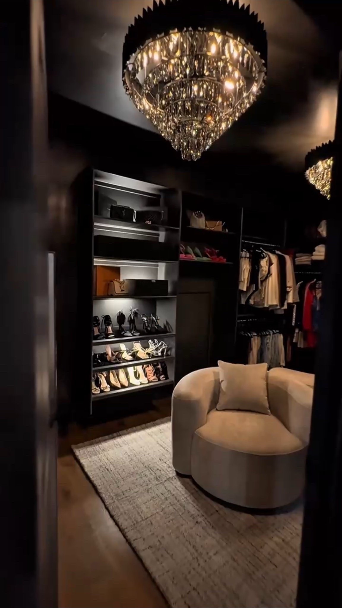 A cozy little spot inside the dreamiest walk‑in closet. I love how the soft chair and textured rug warm up the dark shelving and add balance to the chandelier’s glow. It’s the perfect mix of moody, neutral, and inviting.



#closetgoals #moodyhome #homeinspo #interiordesign #neutraldecor #closetdesign #cozyspaces #homestyling #luxuryinteriors #organizedhome #summerthompsonstyles


#LTKHome