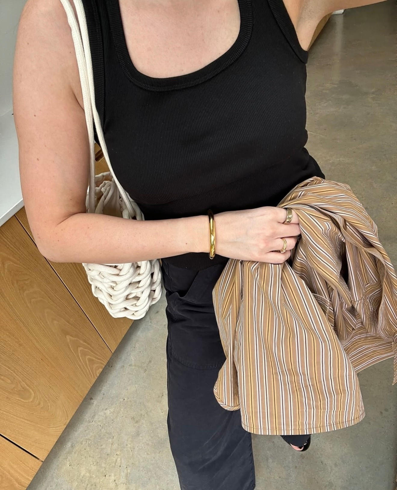 Effortless all black casual look for running errands, working from home or light layers at the weekend, with a pop of fun striped and a woven bag for texture.

#LTKstyletip #LTKsummer