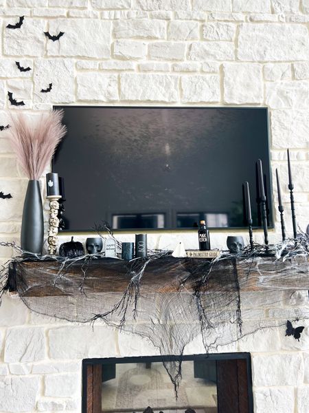 My gothic inspired mantle this year! I am hosting my first ever Halloween party and really wanted to base it around our theme 🥰👻🍁

#LTKunder50 #LTKSeasonal #LTKhome