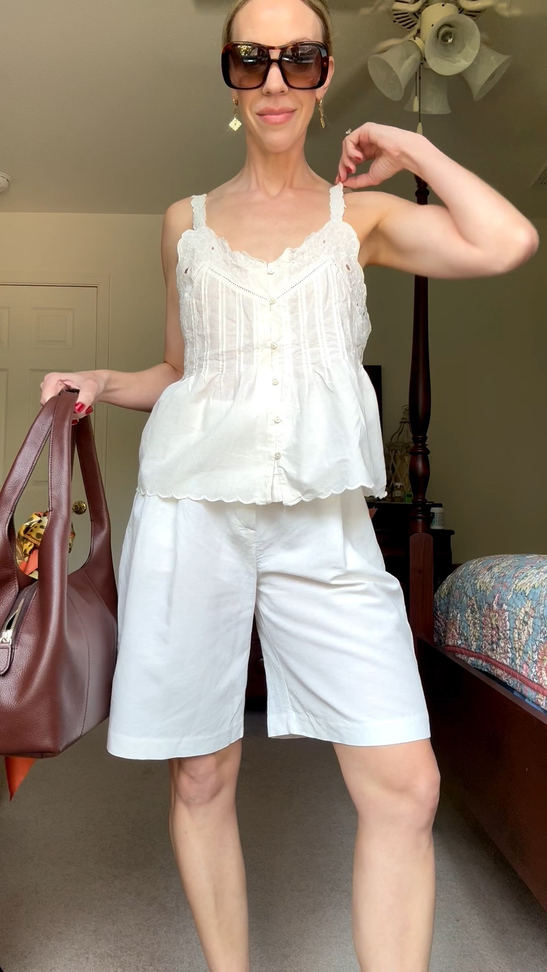 Bermuda shorts are under $30 - styling them with an eyelet tank and silk scarf tied on my handbag for a lunch date

#LTKSeasonal #LTKOver40 #LTKgrwm