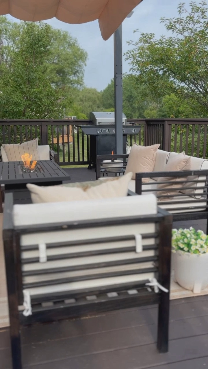 Outdoor patio decor, patio essentials, deck paint, patio paint, patio seating, outdoor seating, affordable patio set, black and white patio furniture, black end table, outdoor side table, outdoor fire pit, patio fire pit, propane fire table, black patio table, outdoor grill, patio pergola, outdoor pergola, outdoor area rug, rug for deck, rug for patio, faux flowers for outside, faux flowers for porch, large white garden pots, outdoor pots, outdoor pillows, patio pillows