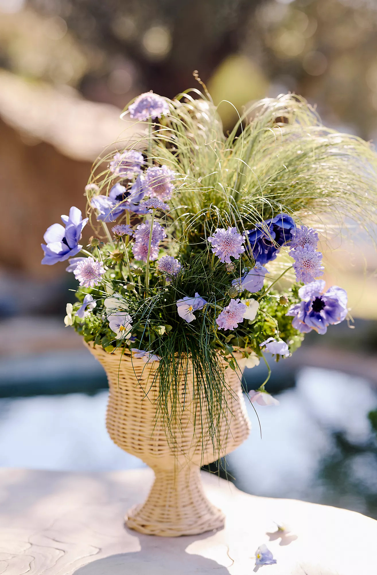 Footed Rattan Urn Planter | Terrain