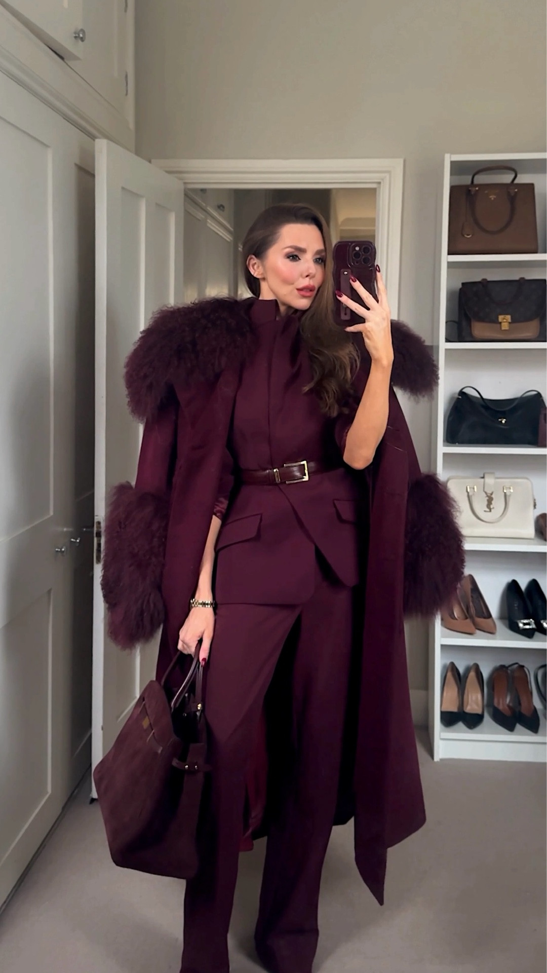 Step out in head-to-toe elegance with this maroon peplum blazer set ✨ A tailored blazer paired with matching trousers and sleek boots creates a striking, streamlined look. Layer a same-colour coat with luxurious fur trim on the collar and sleeves for added warmth and sophistication. Complete the ensemble with a maroon suede tote bag for effortless style that carries all your essentials. Perfect for winter days when you want to feel powerful, polished, and put-together.

#MaroonBlazer #PeplumBlazer #TailoredTrousers #WinterOutfitInspo #LuxuryStyle #OOTDWinter #MonochromeOutfit #ChicWinterLook #DesignerStyle #SuedeTote

#LTKuk #LTKfestive #LTKwinter