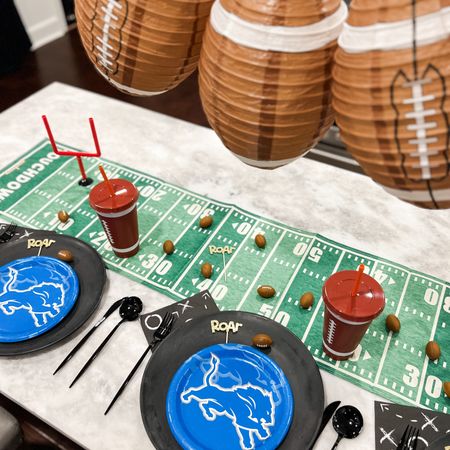 Detroit lions inspired football playoff party! Switch out the lions plates for any team you’re cheering on this year #ltksuperbowl

#LTKparties #LTKhome