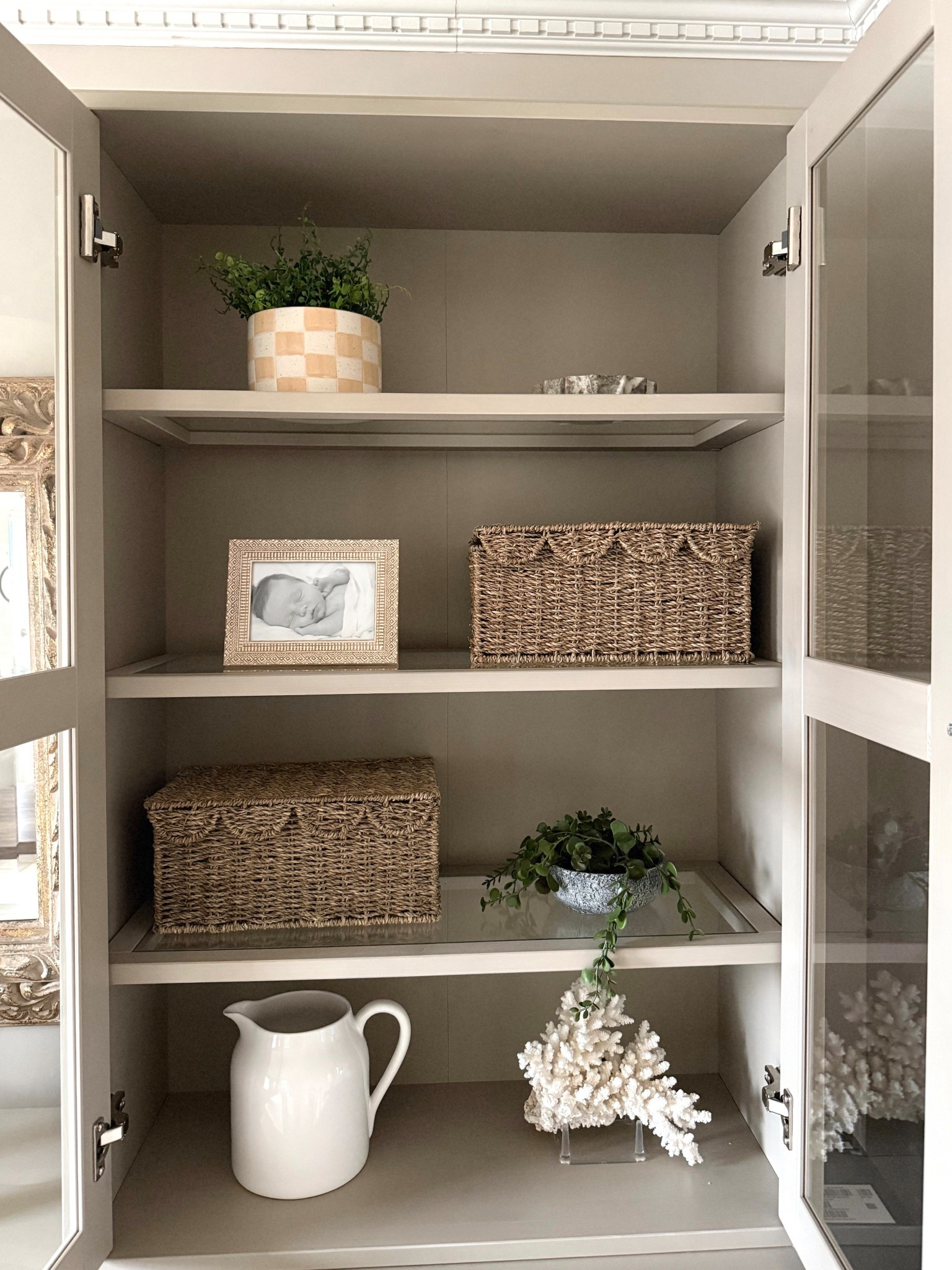 styling our ikea havsta cabinets with a mix of books, ceramics and neutral decor pieces. a few of these little details are recent target finds. perfect refresh for spring  

 #LTKdayinmylife #LTKSeasonal #LTKHome