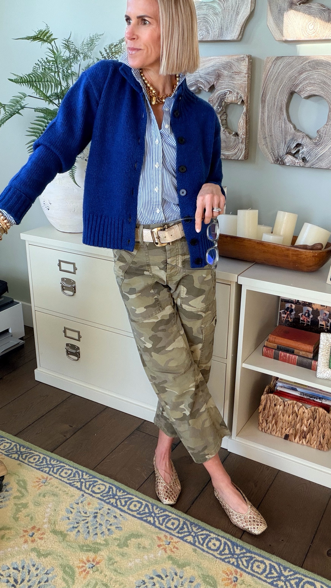 Y’all didn’t tell me I had something in my teeth 🤣🤦🏼‍♀️ between that and the bold prints EVERYWHERE….wow 😉 Regardless the outfit is too good not to get the best lighting and share!! Comment PRINT for the details. 

I wore this a while back and so many of you loved it that I knew this outfit had to come on a work trip with me!  🫶🏻 the colors and the print are what make this outfit stand out 💚💙. The pinstripe is subtle enough to keep the camo the main focus!  And the cardigan pulls it all together!  

Headed back home today beauties…see you back in my office tomorrow ❤️

#LTKootd #LTKWorkwear #LTKgrwm