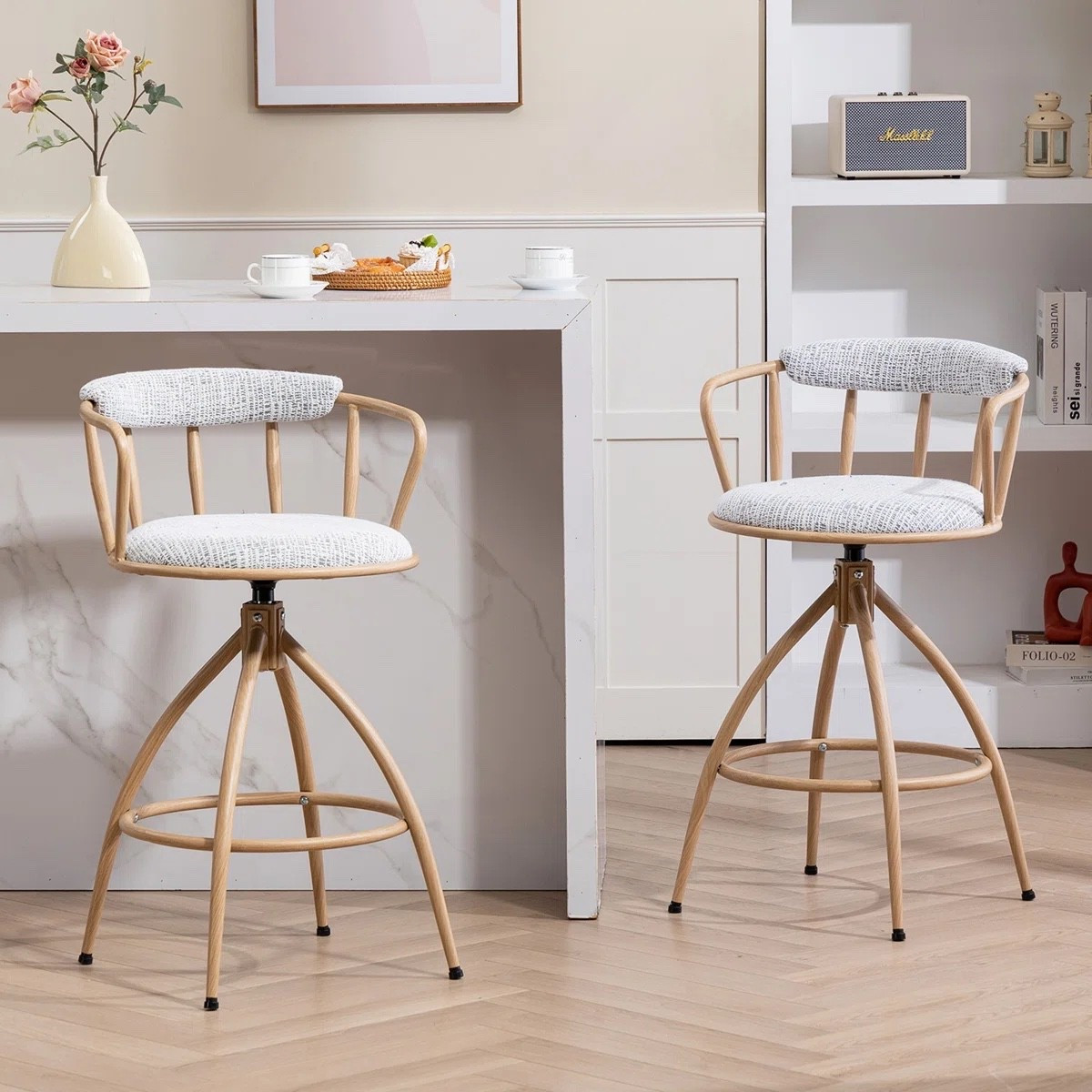 These 17 Stories swivel counter-height bar stools from Wayfair are such a good mix of comfort and style. Love the soft fabric seat, curved back, and warm wood-look frame that gives a modern, organic feel. The swivel feature makes them perfect for kitchen islands and casual dining, especially in bright, neutral spaces.

#LTKHome