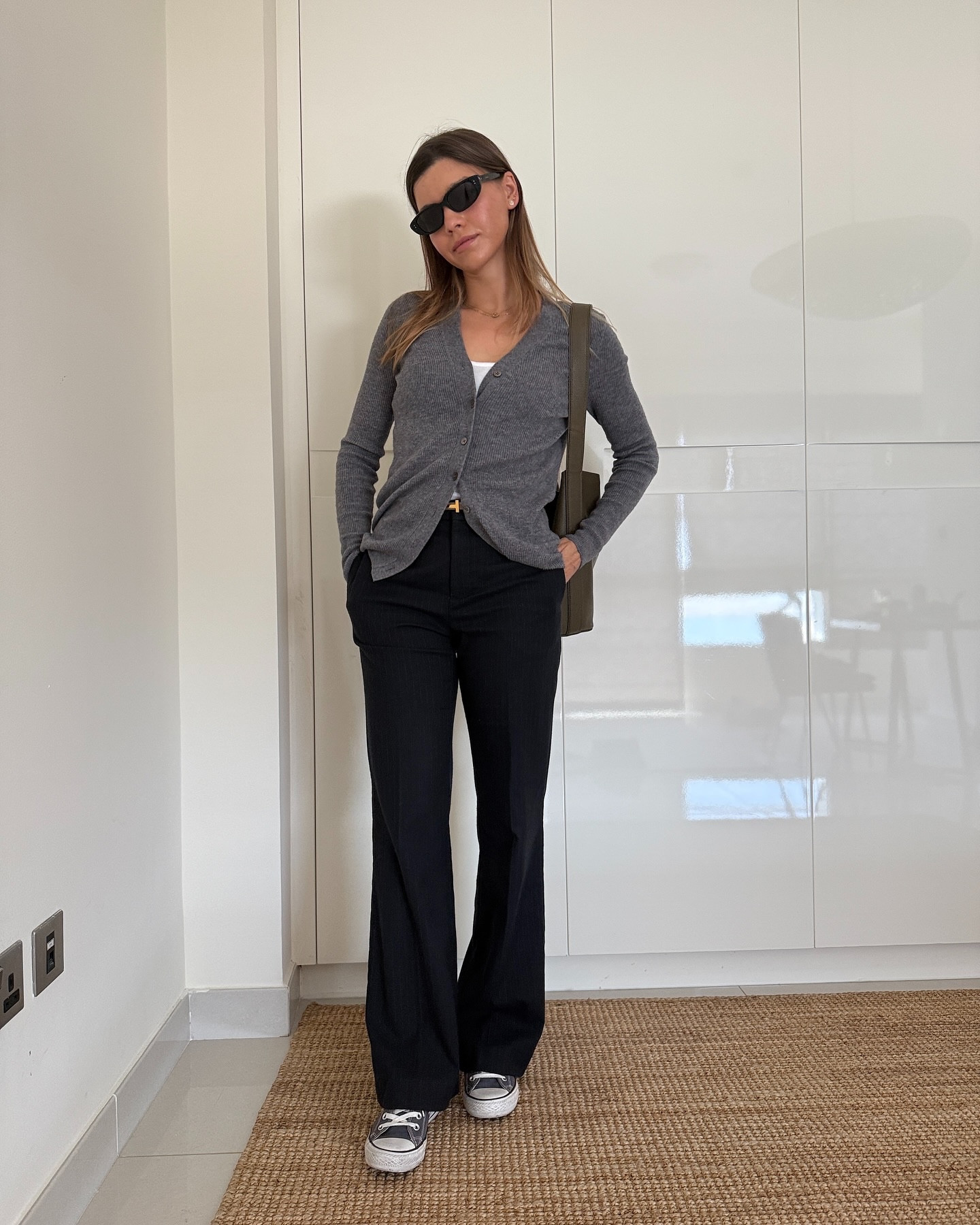 Comfy work from home or elegant corporate outfits, Work outfit, work from home outfit, executive style, office outfit ideas, gray cardigan outfit, navy trousers, converse

#LTKFindsUnder100 #LTKWorkwear