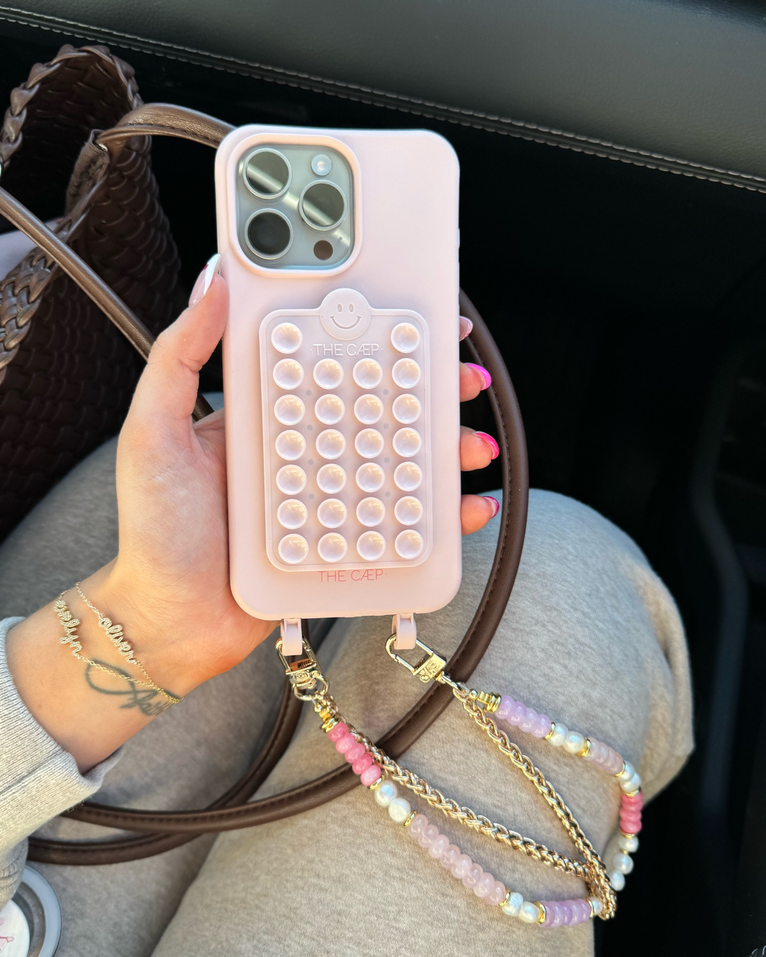 My phone case and accessories are The Caep!! I’ve gotten tons of questions on this — will share more stories on it tomorrow but I LOVEEE having the wristlet chains!!!  🩷💕 

iPhone 15, iPhone accessories, phone charms, phone chain, gold chains, octobuddy, iPhone pro, pink phone case 

#LTKTravel #LTKFindsUnder100