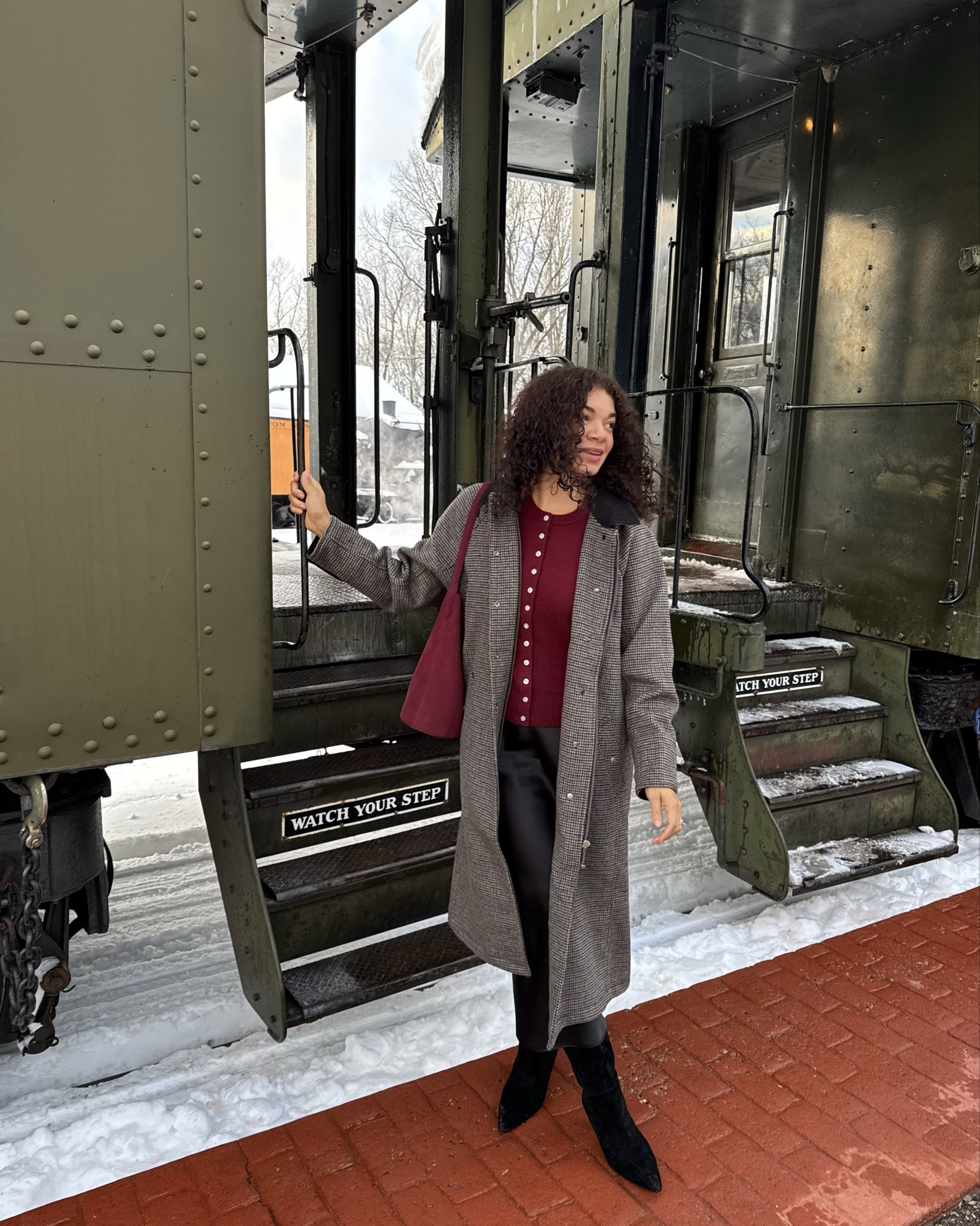 Vintage train ride holiday outfit for a festive winter activity 🚂 burgundy cardigan sweater, slip skirt, knee high boots, long barn coat, and burgundy bucket tote 

#LTKootd #LTKHoliday