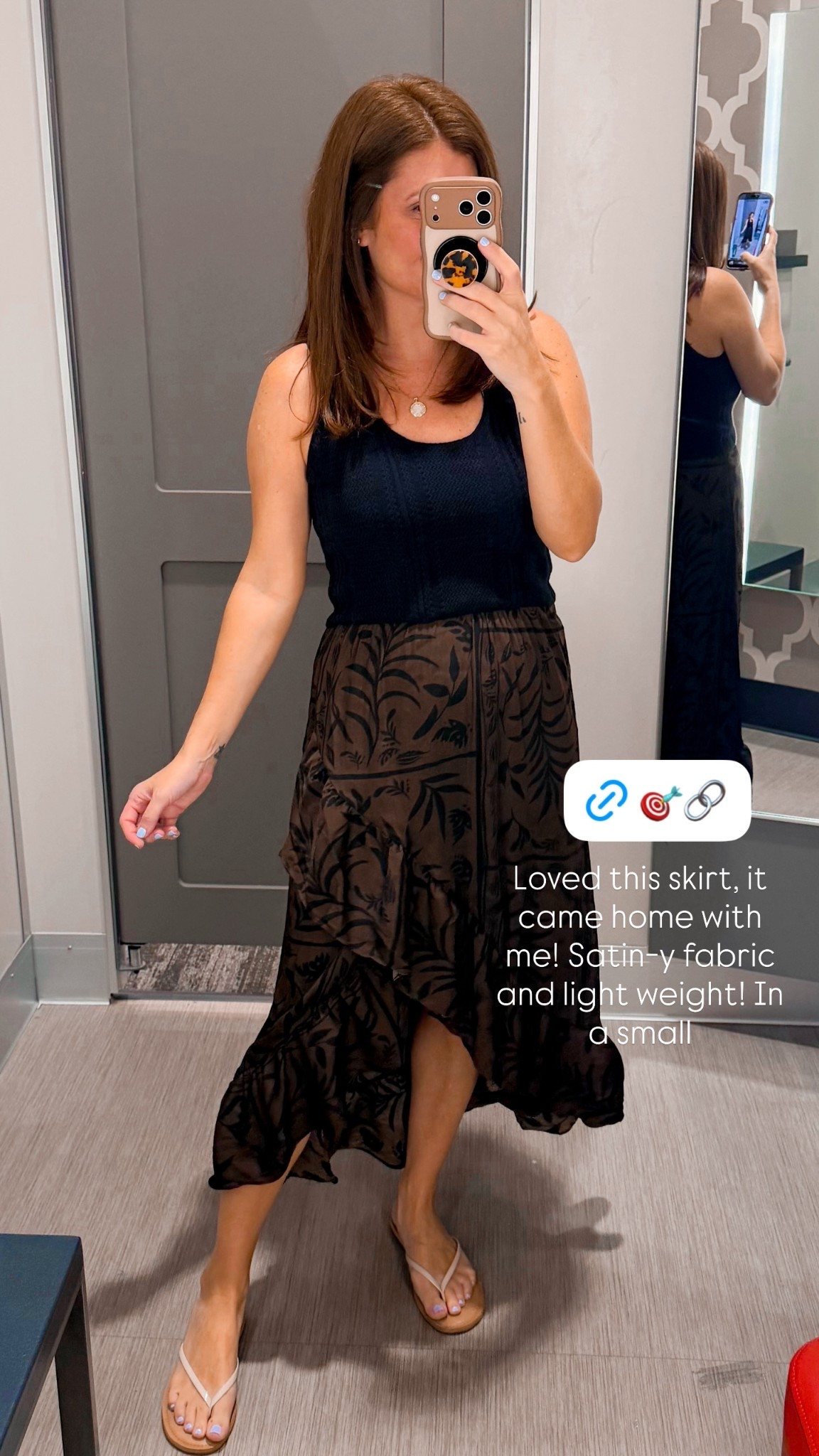 Loved this skirt, it came home with me! Satin-y fabric and light weight! In a small