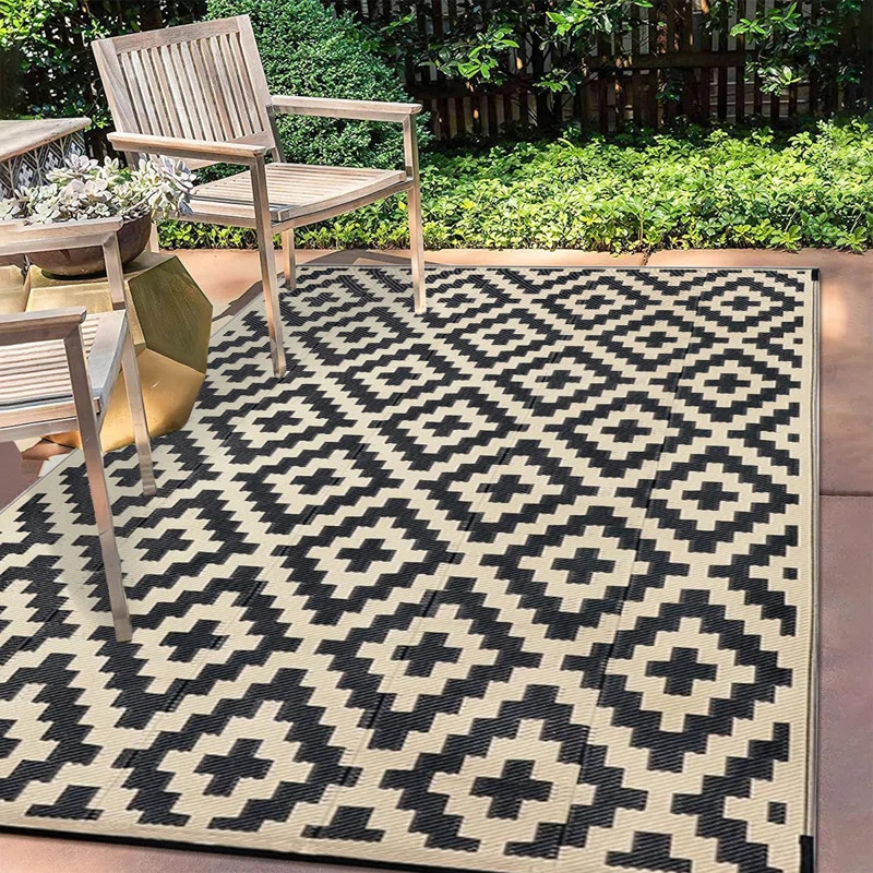 Geometric Black and Beige Outdoor Carpet with Cross Pattern | Wayfair North America