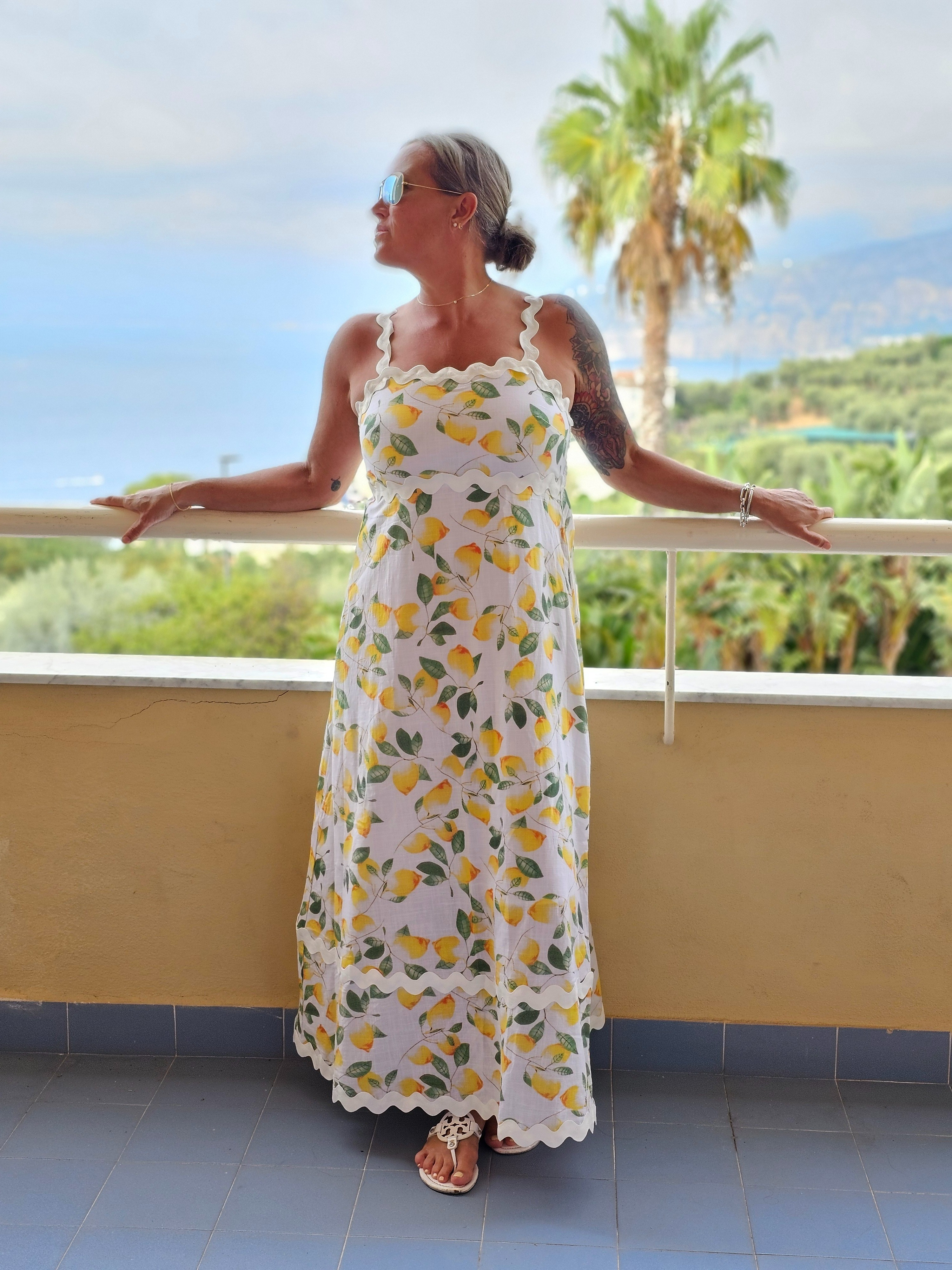 Could this be any cuter for summer? This summer dress has the best detailing and the lemons create such a vibe for the climate. I took this on vacation and it was so perfect in Italy.

I am 5’6 160lbs and I am wearing a medium.


#LTKOver40 #LTKSeasonal #LTKMidsize