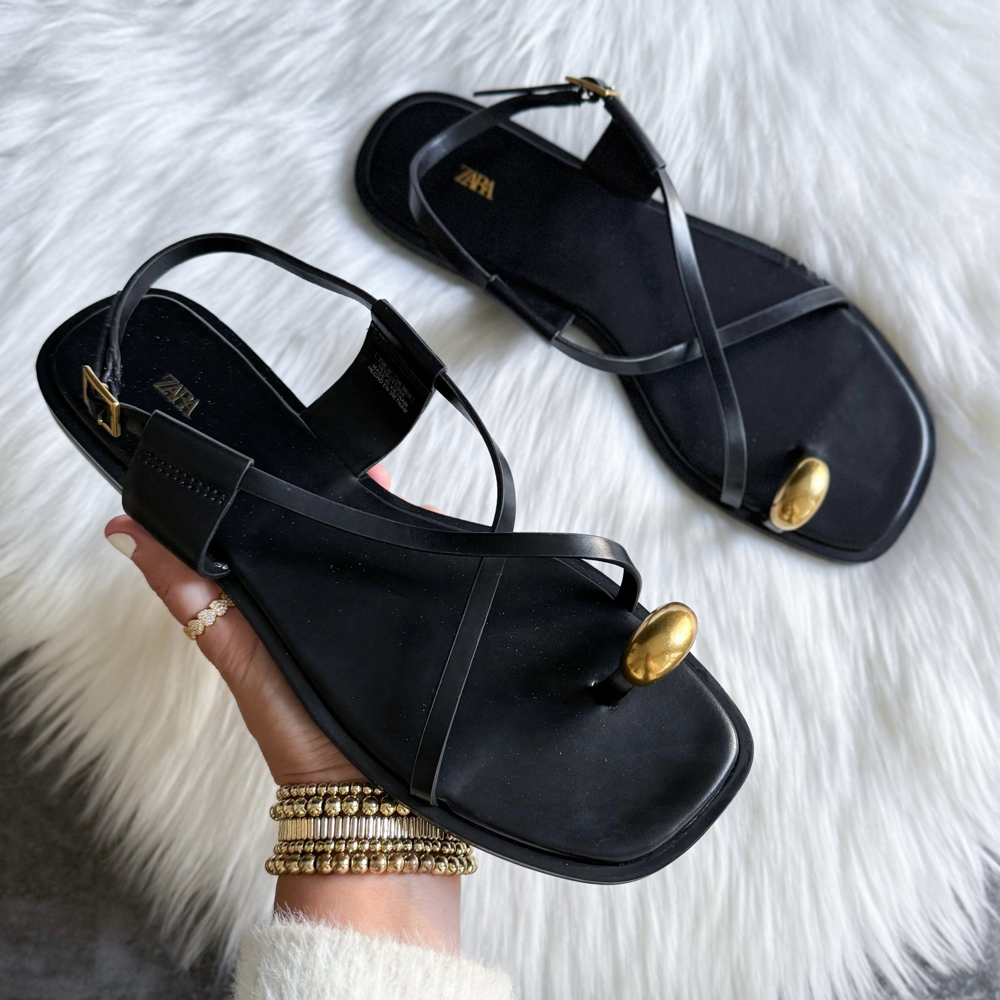 Flat strappy sandals with metal embellishments size up 1/2 size 