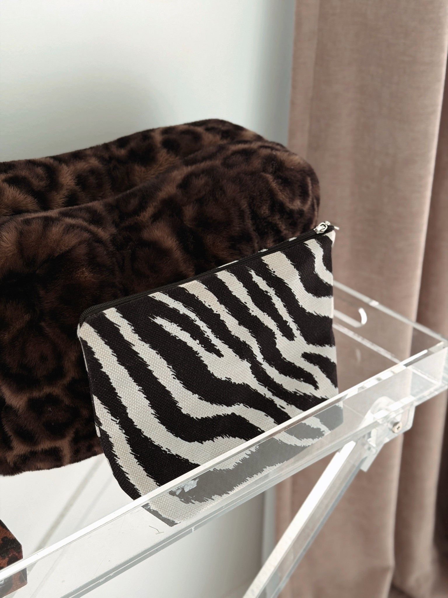 Grabbed this cute zebra print makeup bag from Amazon to bring to Colorado this weekend! Under $10

Also, forever obsessed with Apparis Noor leopard print bag. Worth the splurge!

#LTKBeauty #LTKgrwm