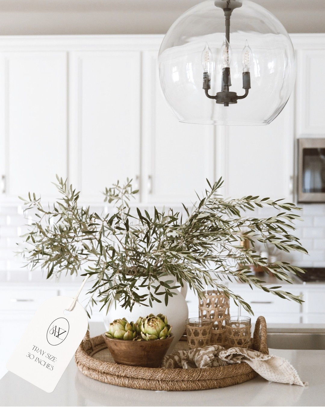 Kitchen and Dining Home Decor - Tray Decor - Coffee table decor - white vase - anthro pot - Anthro mirror - natural wood table 

#LTKVideo #LTKhome #LTKstyletip 

#LTKSaleAlert #LTKHome #LTKSpringSale