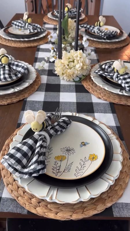 Pretty spring  Mother’s Day tablescape ideas with black and white checkered napkins, bee accents , candlesticks and spring floral stems 

#LTKVideo #LTKhome #LTKSeasonal