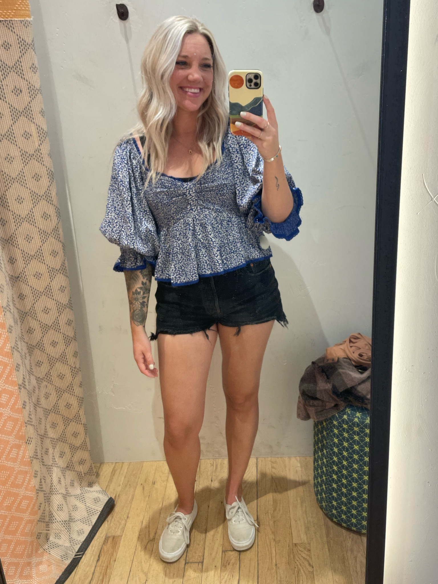 Size small in the top
Size up in shorts 
Shoes TTS