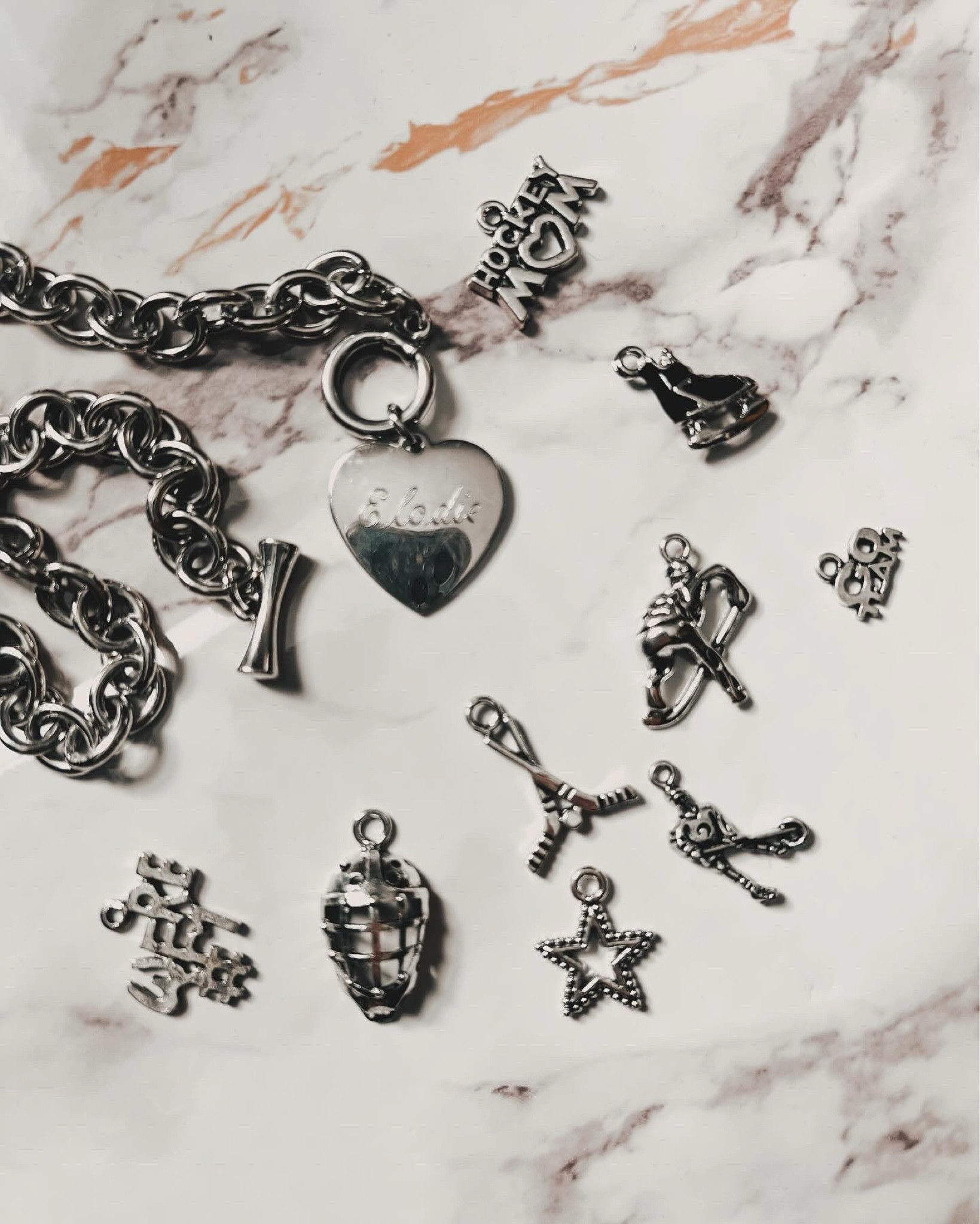 Got these cute charms off Etsy to add to my necklace and make a customized charm necklace. Super affordable and would be easy to change out in the future 


Hockey, hockey mom, sports mom, charm, charm necklace, diy 

#LTKstyletip #LTKfindsunder50 #LTKover40