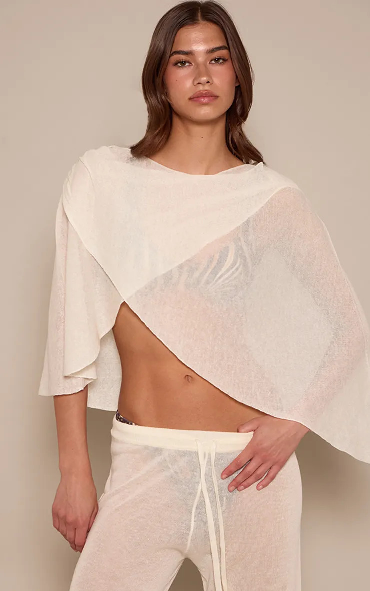 Cream Sheer Knit Draped Poncho Top | PrettyLittleThing | PrettyLittleThing UK