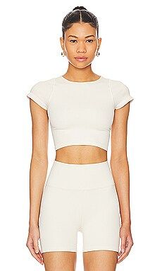 WellBeing + BeingWell StretchWell Maya Cropped Tee in Birch from Revolve.com | Revolve Clothing (Global)