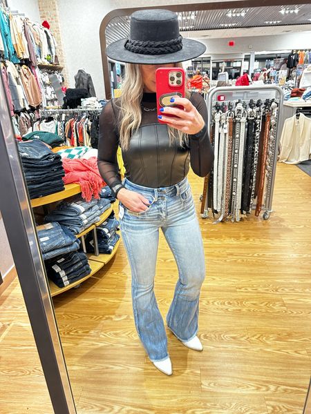 High rise slim fit flare jeans from Buckle Black (fit 35) and a faux leather and mesh top. Small top - size 26 x 32 jeans. Sharing some of my fave talk and short boots from Buckle as well! 

#LTKHoliday #LTKshoecrush #LTKSeasonal
