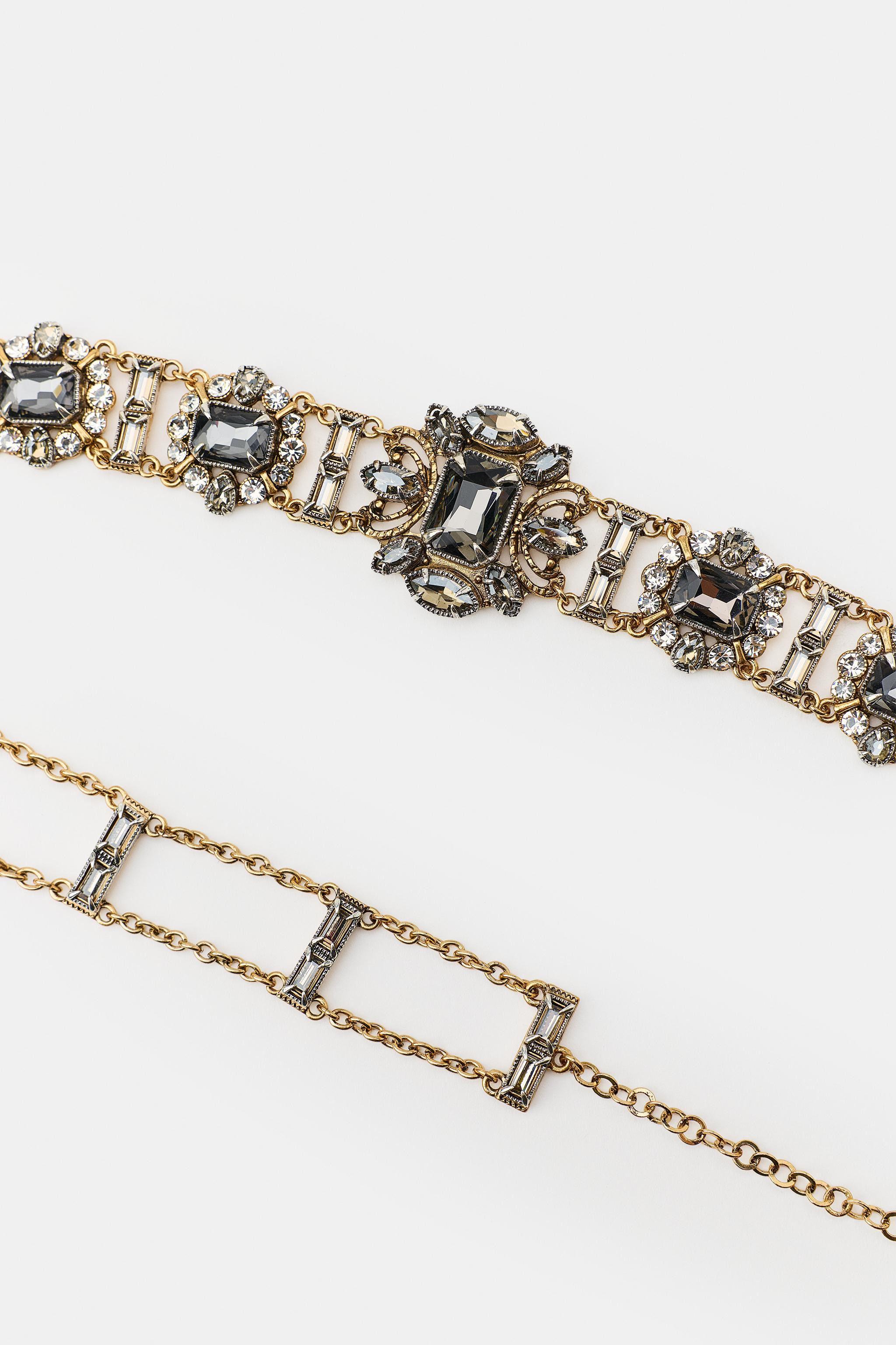 Multi-piece belt with metal links. Featuring contrasting jewel appliqu\u00e9s. Lobster clasp fast... | Zara IT