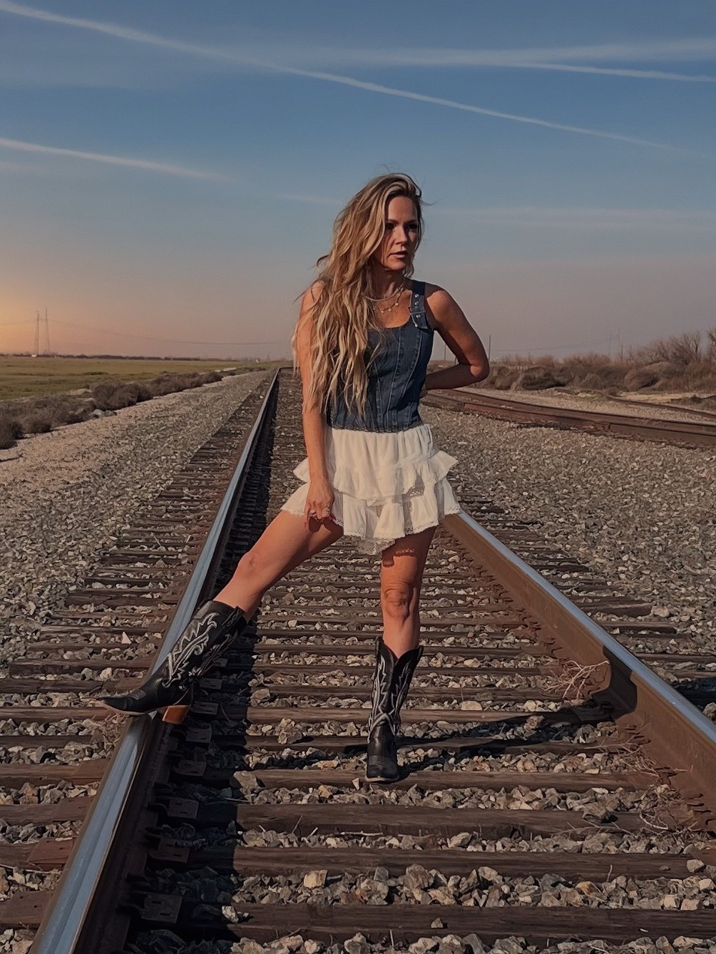 Western Romance Collection from Lulus.
•
#western #countryconcert #countryconcertlook #countryconcertoutfit #summerconcertoutfit #festivaloutfit #jeancorset #denimtanktop #denimlook #boots #whiteruffleskiry #whiteeyeletskirt #concertoutfit #summeroutfit #trendylooks #lulus

#LTKStyleTip #LTKSeasonal #LTKFestival