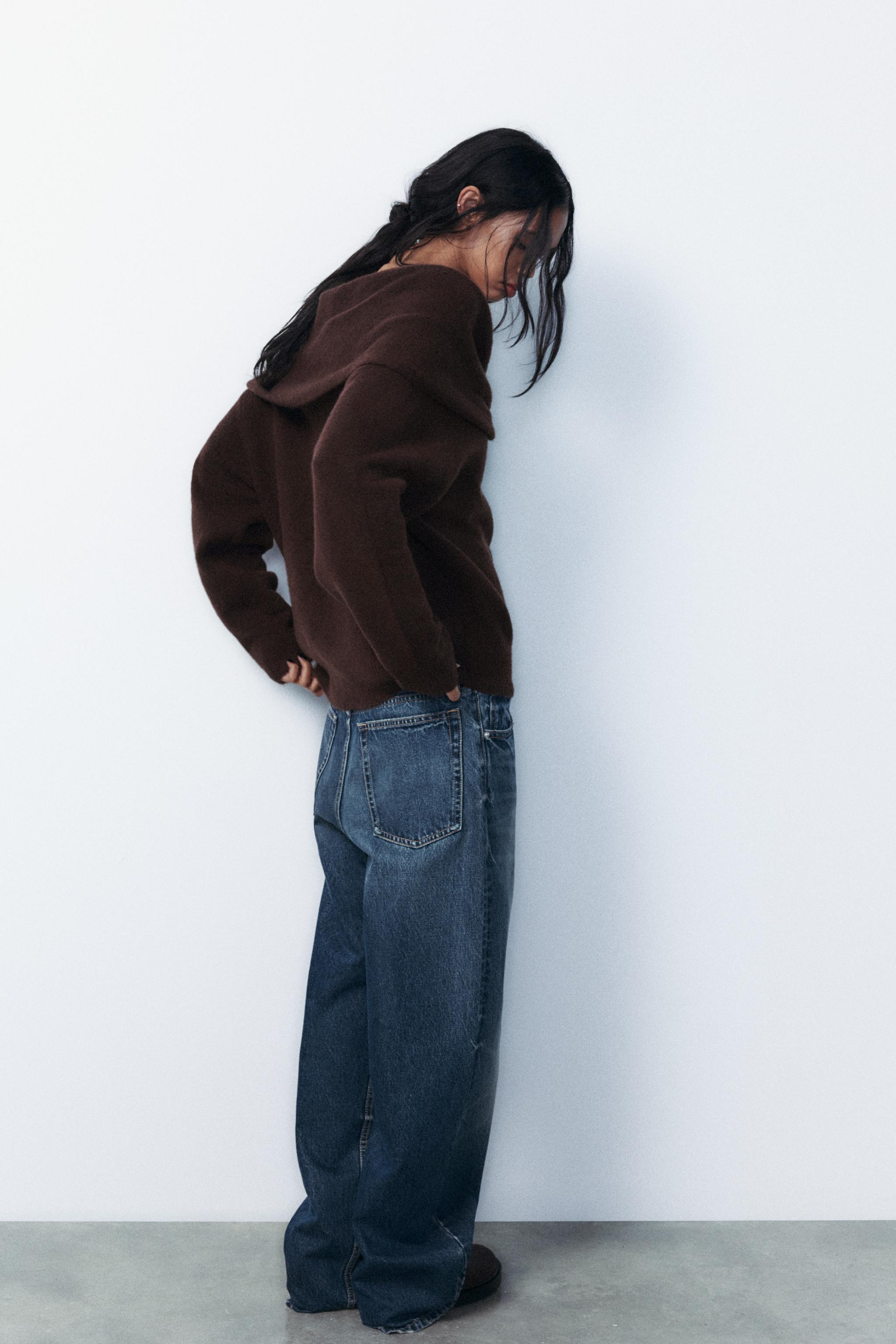 Sweater with foldover straight neckline with ring appliqué and exposed shoulders. Long sleeves. ... | Zara US