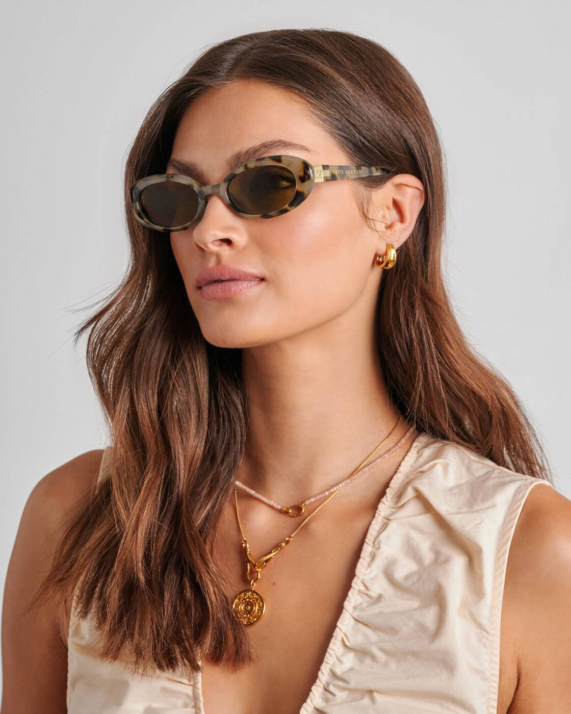 Nissi Slim Oval Sunglasses in Light Tortoiseshell | Katie Loxton Ltd. (UK)