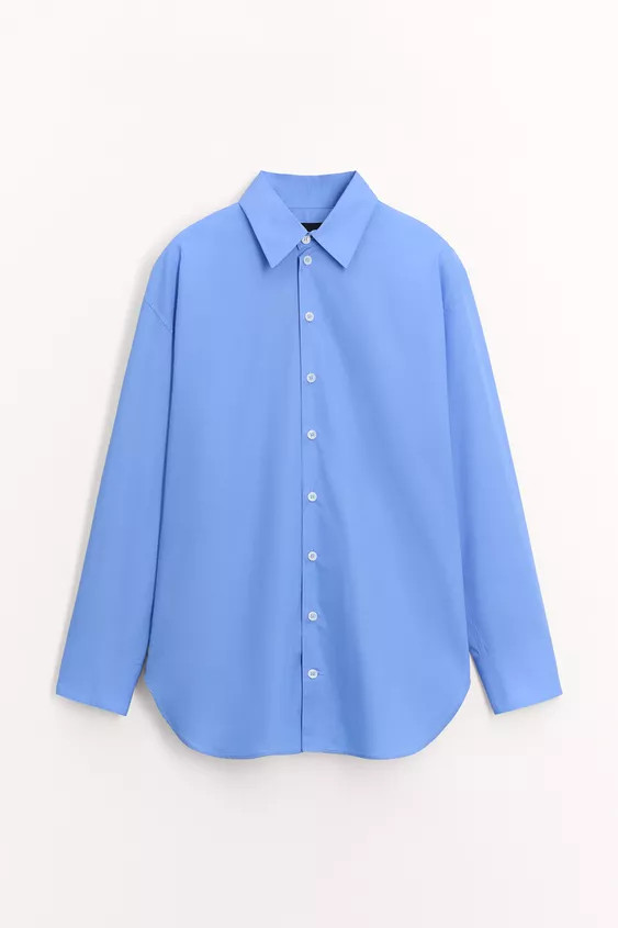 ZARA WOMAN COLLECTIONCotton poplin shirt. Featuring a collar, long sleeves with cuffs, an asymmet... | Zara UK