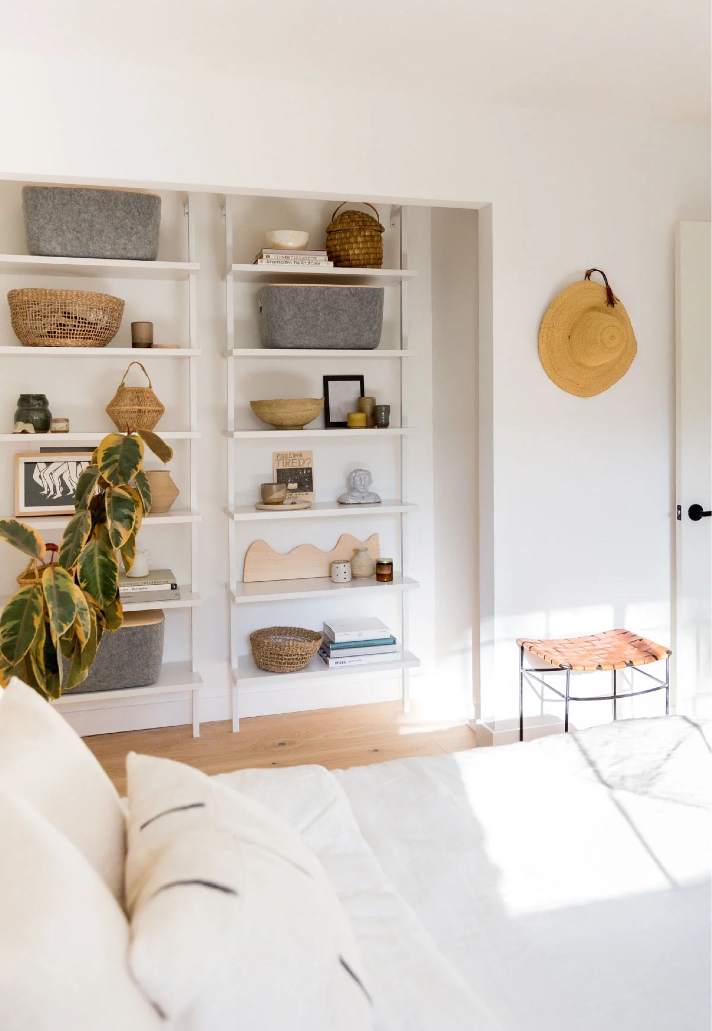 Guest bedroom styling ideas for a closet that doesn’t get much use? Turn it into open shelving to display all of your favorite home decor and storage baskets.

#LTKhome #LTKstyletip #LTKFind