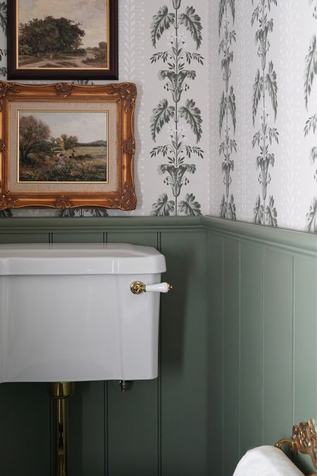 antique toilet roll holder, antique frames, vintage art, powder room decor