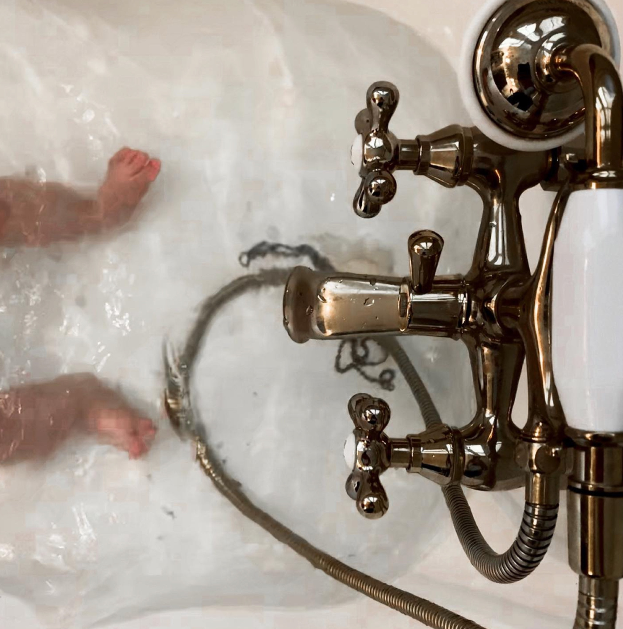 Washed away the weekend. This claw foot tub sprayer has diligently been used as a pretend phone from “back in the day” when phones were connected to the wall (as my older offspring explains).

New or old tubs, brass and porcelain will always bring a touch of vintage into your bathroom space.

#LTKhome