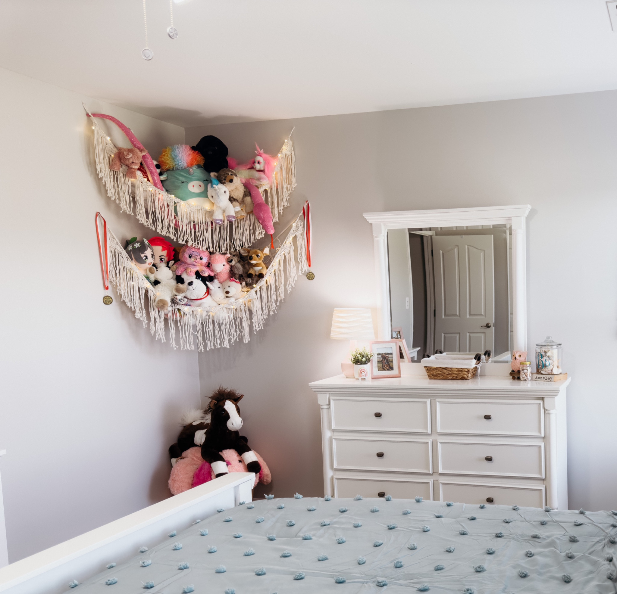 When it comes to stuffed animals WE HAVE A-LOT! Buy these adorable macrame stuffed animal hangers to display them but they are still accessible for your child to play with! These even come with ✨ twinkle lights! ✨ I’ve also added some other items we use to organize our daughter’s room! #homedecor #organization #kids

#LTKkids #LTKbaby #LTKhome