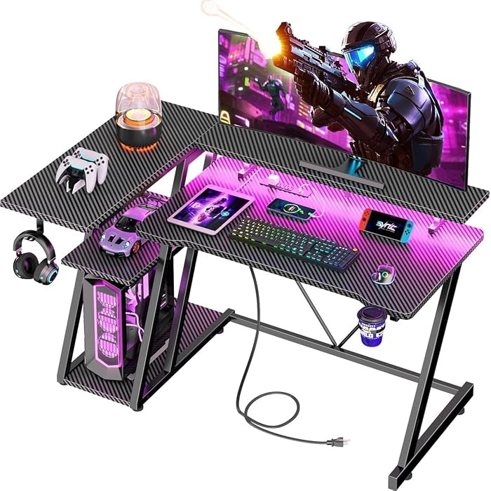 Korfile 40 Inch Gaming Desk with Power Outlet, LED, Carbon Fiber Black | Amazon (US)